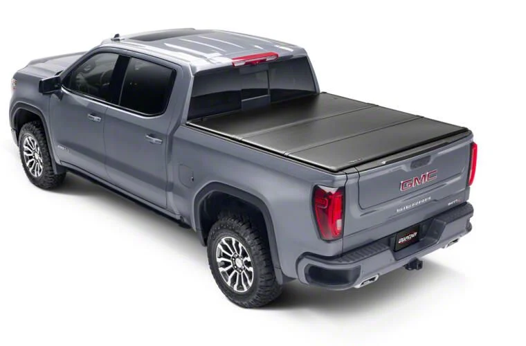 UnderCover Triad Hard Folding Tonneau Cover (02-18 RAM 1500 w/ 6.4-Foot Box & w/o RAM Box)